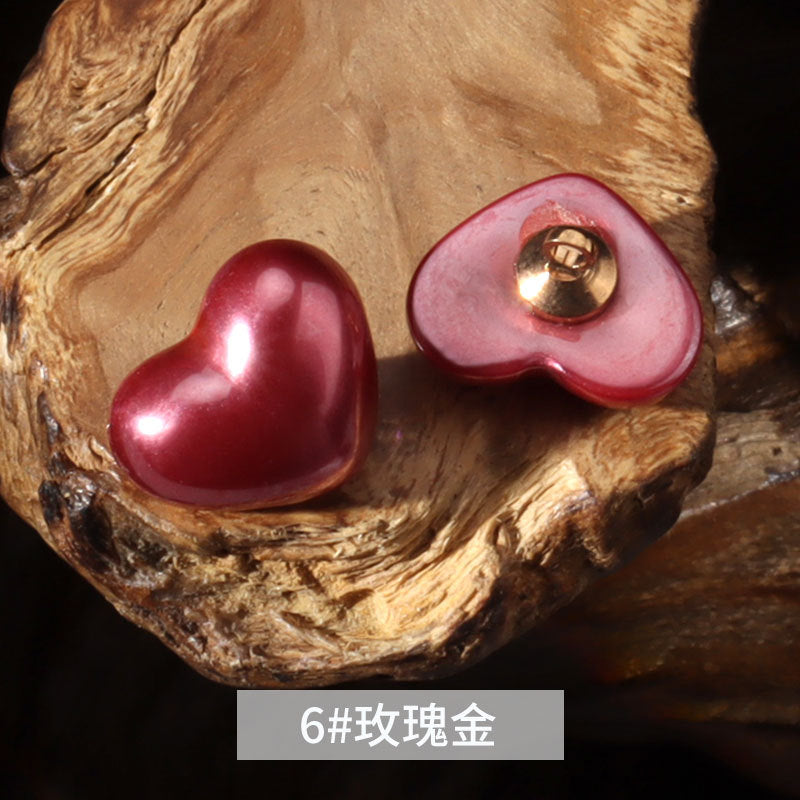 14mm heart-shaped plastic decorative button in rose pink with metal shank