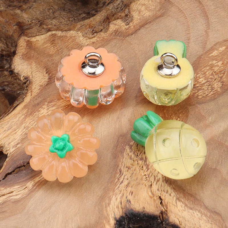 Kids fruit buttons with metal posts: peach flower, yellow pineapple, orange flower, light green