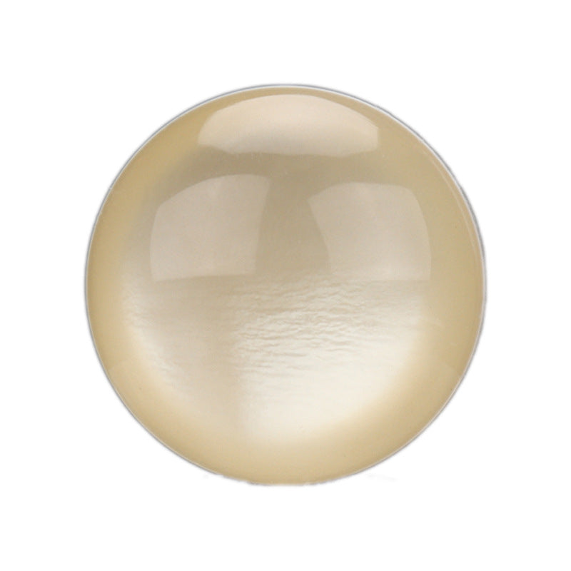 White/cream hemispherical shell button, glossy, front view
