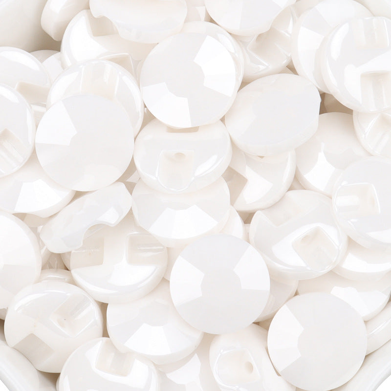 White ceramic shirt buttons, smooth round faces and shank backs