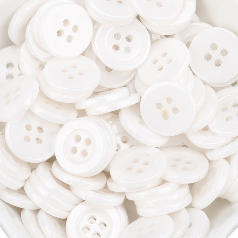 Assorted white ceramic buttons with 4-hole fronts, bulk quantity
