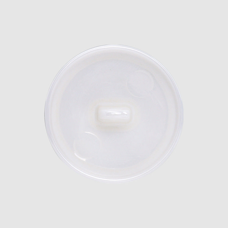 Ceramic flat button with shank, white back view, 15–25 mm