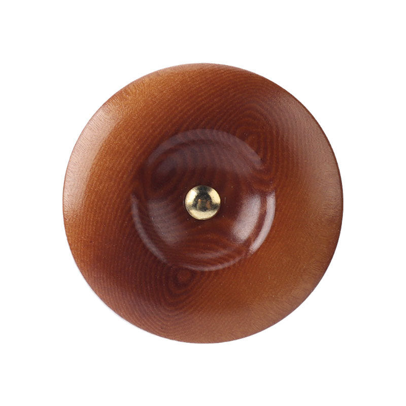 Brown round corozo shank button with brass shank, front view
