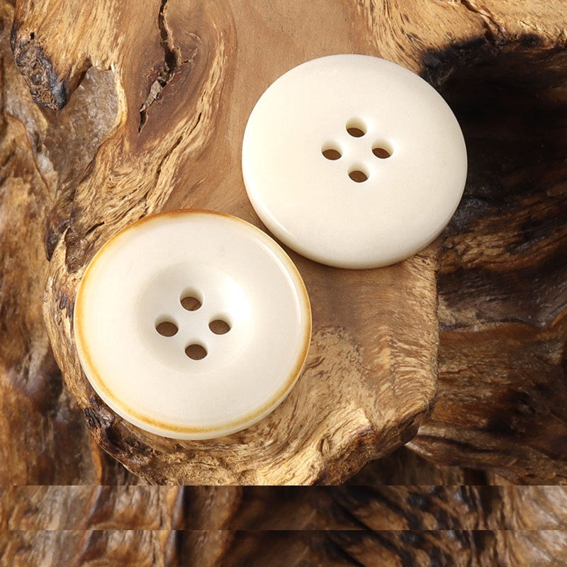 Round 4-hole buttons, white with burnished rim edge, four holes