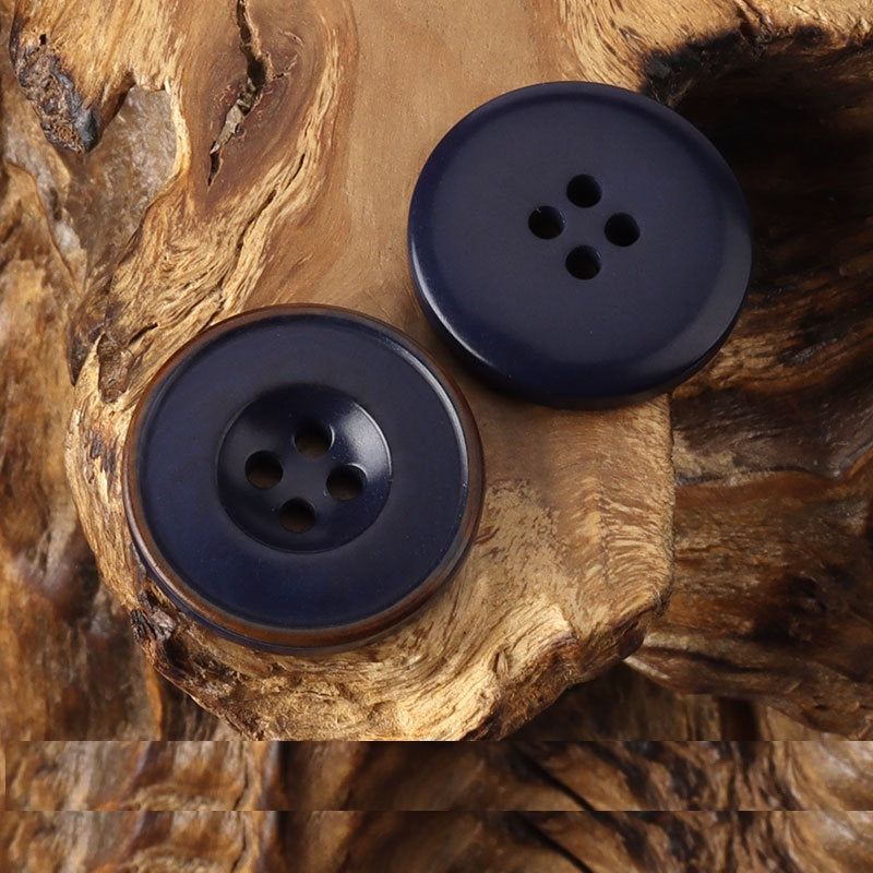 Round 4-hole buttons, dark blue pair with burnished rim, four-hole design