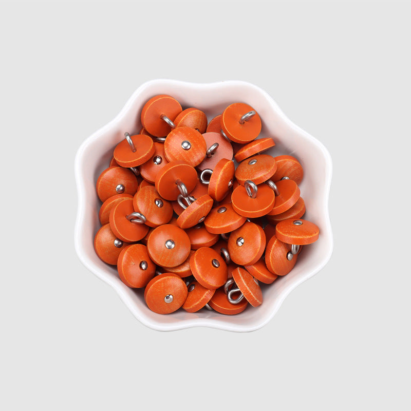 Bowl of round natural wood buttons in orange with metal shanks, 11.5mm