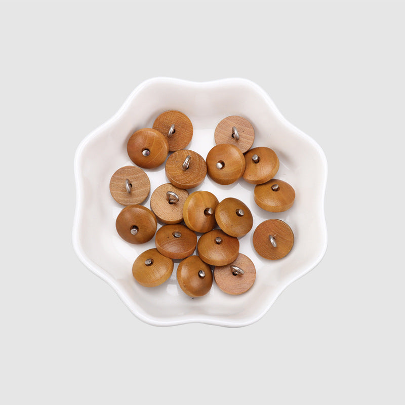 Bowl of round natural wood buttons in brown with metal shanks, 11.5mm