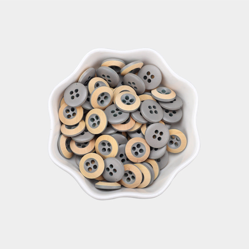 11.5mm round 4-hole baked wood buttons, dark grey and light wood, in bowl