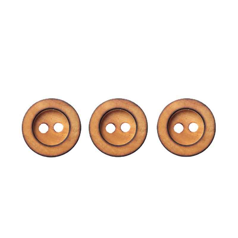 Three round 2-hole poplar wood buttons, tan-brown, front view