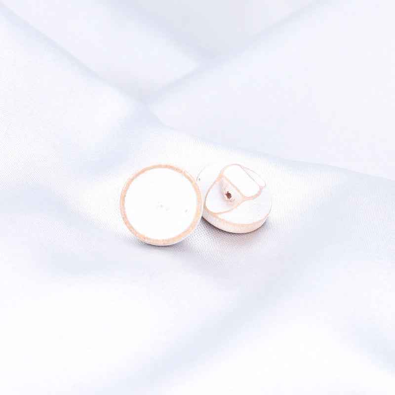 Two 11.5mm round wood buttons: white front and side shank view