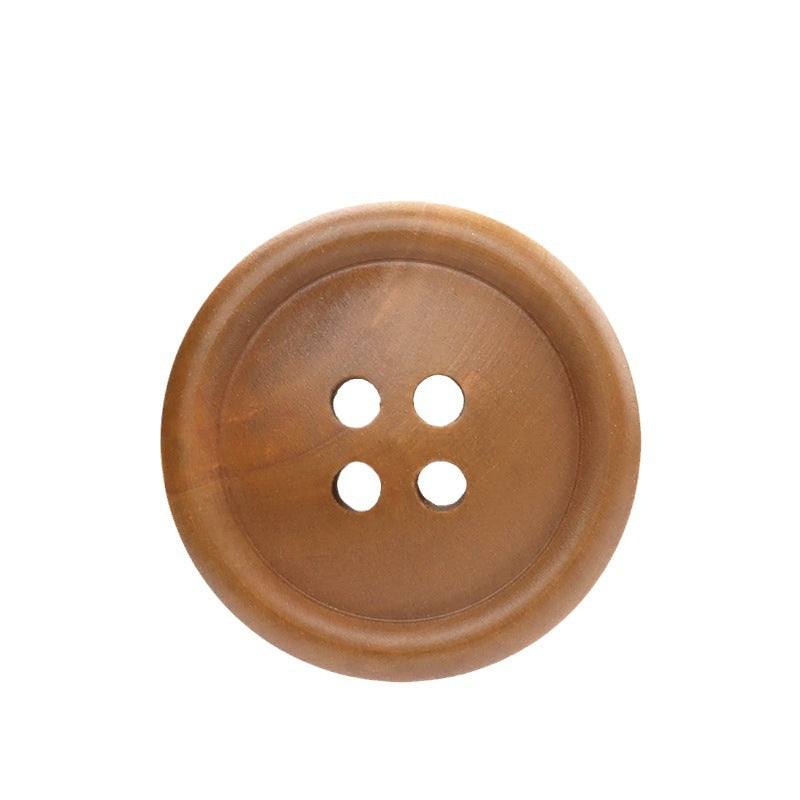 Round 4-hole poplar wood button, dyed finish, natural brown front view.
