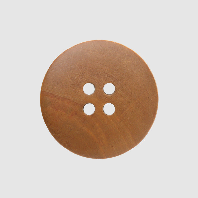Round 4-hole poplar wood button, flat dyed brown with four holes.