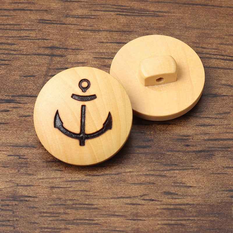 Light wood anchor buttons with shank holes, showing front and reverse sides