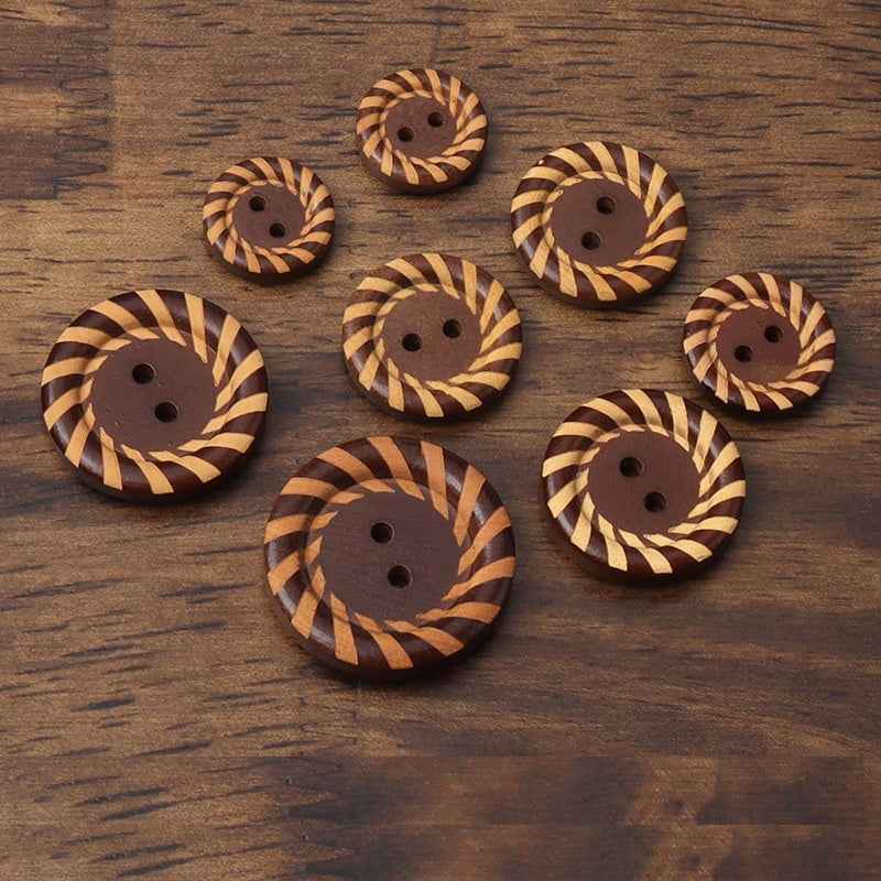 Set of brown round 2-hole wood buttons, striped laser-carved front designs