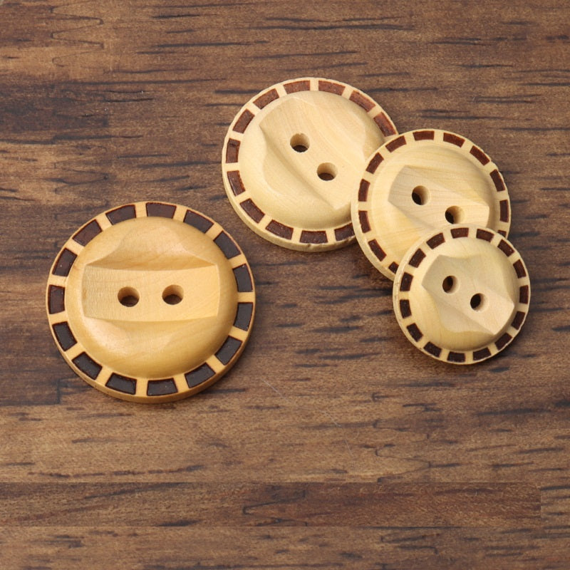 Set of round 2-hole poplar wood buttons with dark segmented edge and 2 holes