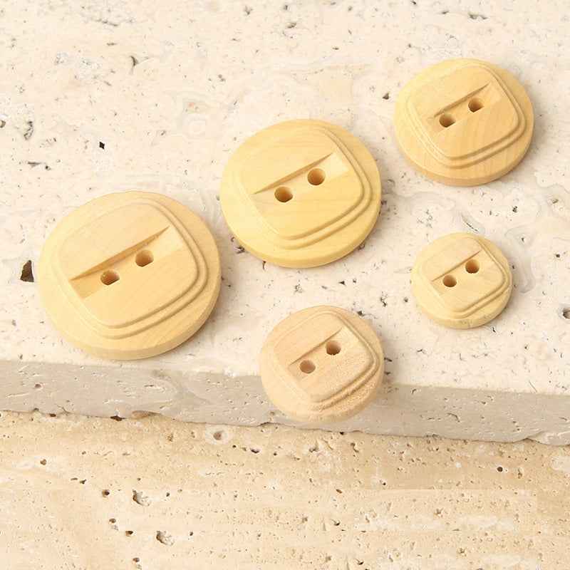 Assorted round natural poplar wood 2-hole buttons, beige, engraved front
