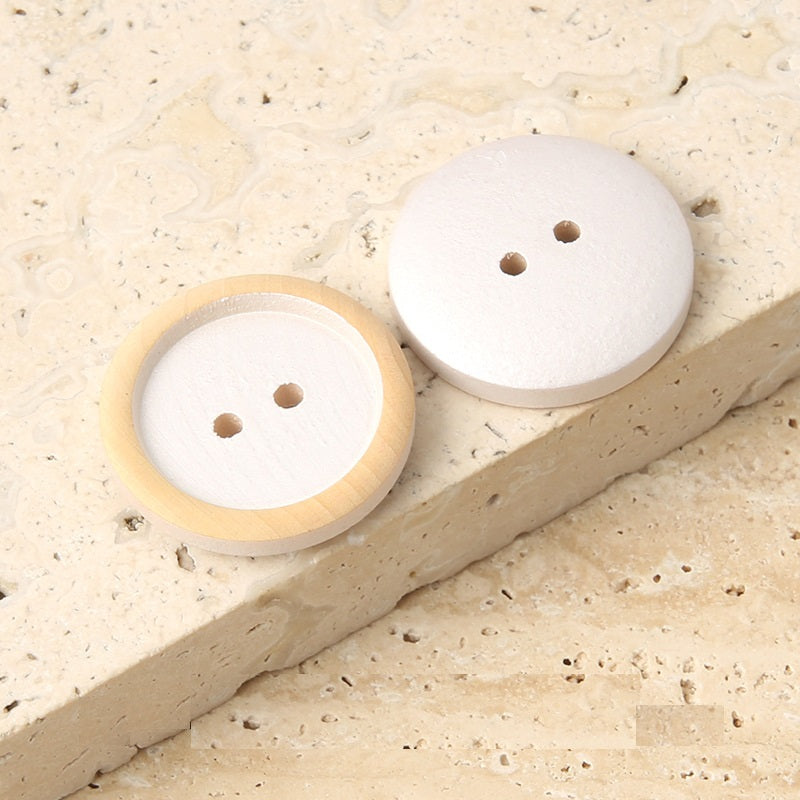 Round wood buttons, 2 holes, distressed natural with white paint, 11–25 mm (pair)