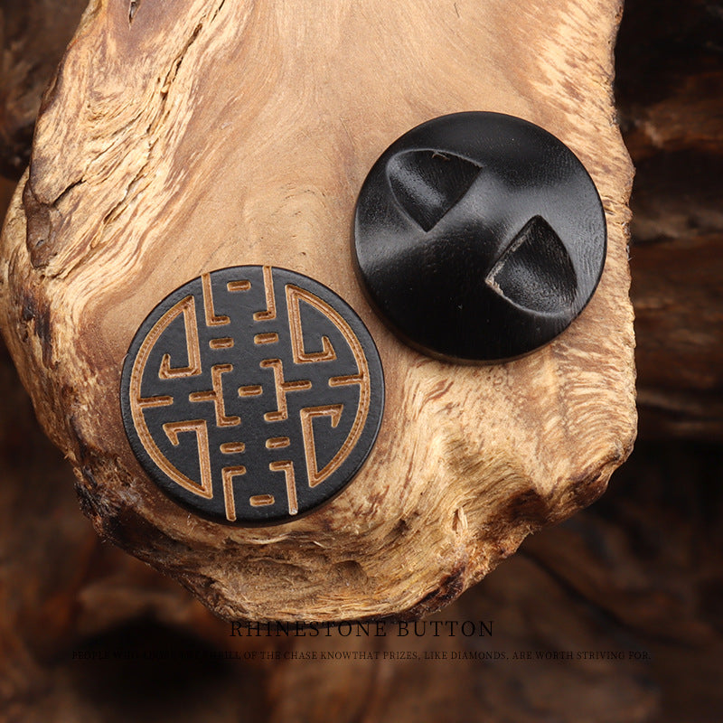 Round horn button front with laser-engraved Chinese character, dark horn with gold