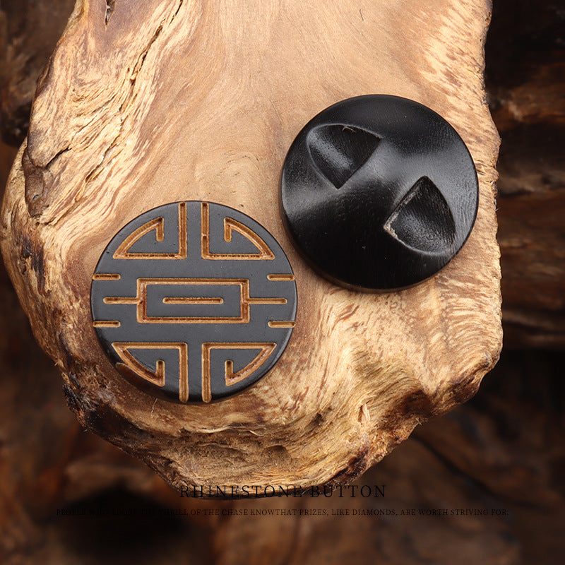 Round horn button with laser-engraved Chinese character, dark horn and gold detailing