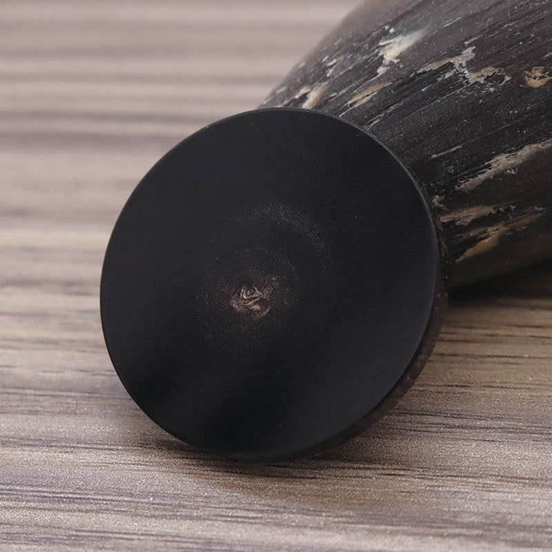 Black round flat genuine horn button with shank on the back