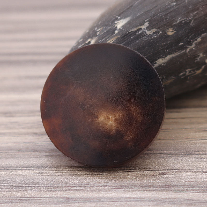 Coffee-brown round flat genuine horn button with shank on the back