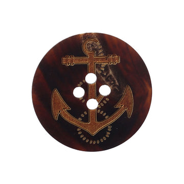 Matte round 4-hole button with gold anchor-and-cross pattern, dark navy