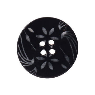 Round black horn button, 4-hole design with white floral leaf pattern