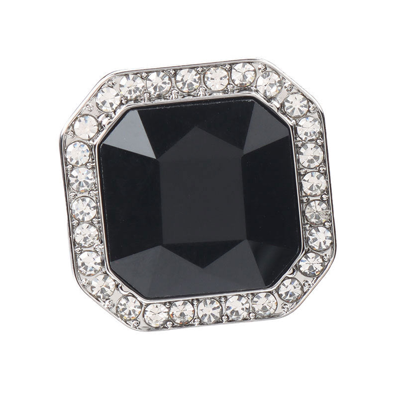 Square rhinestone shank button with dark black crystal center and silver-tone border