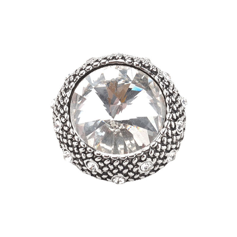 Silver round rhinestone button with large clear faceted center and textured bead rim