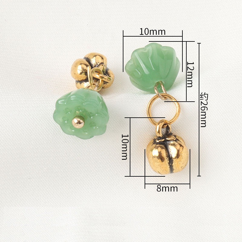 Light green frog knot pendant button with gold bell bead, approx 26mm length