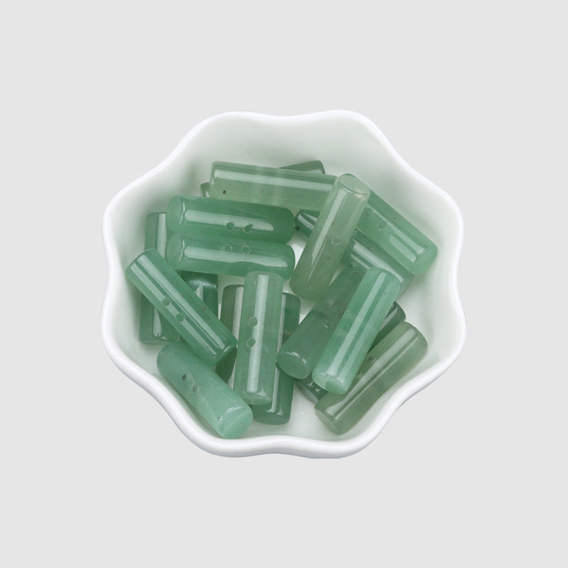 Bowl of 25mm light green cylindrical two-hole buttons (4 pcs)