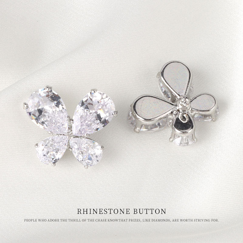 Rhinestone butterfly metal button, silver setting; two pieces shown