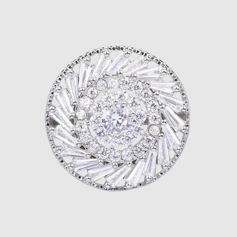 Round rhinestone crystal button with faceted center stones and baguette accents
