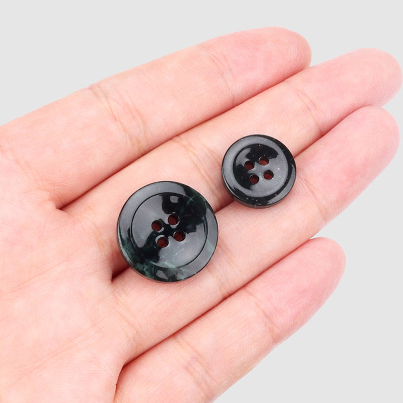 Two glossy dark green round jade buttons with four holes, 15/20 mm