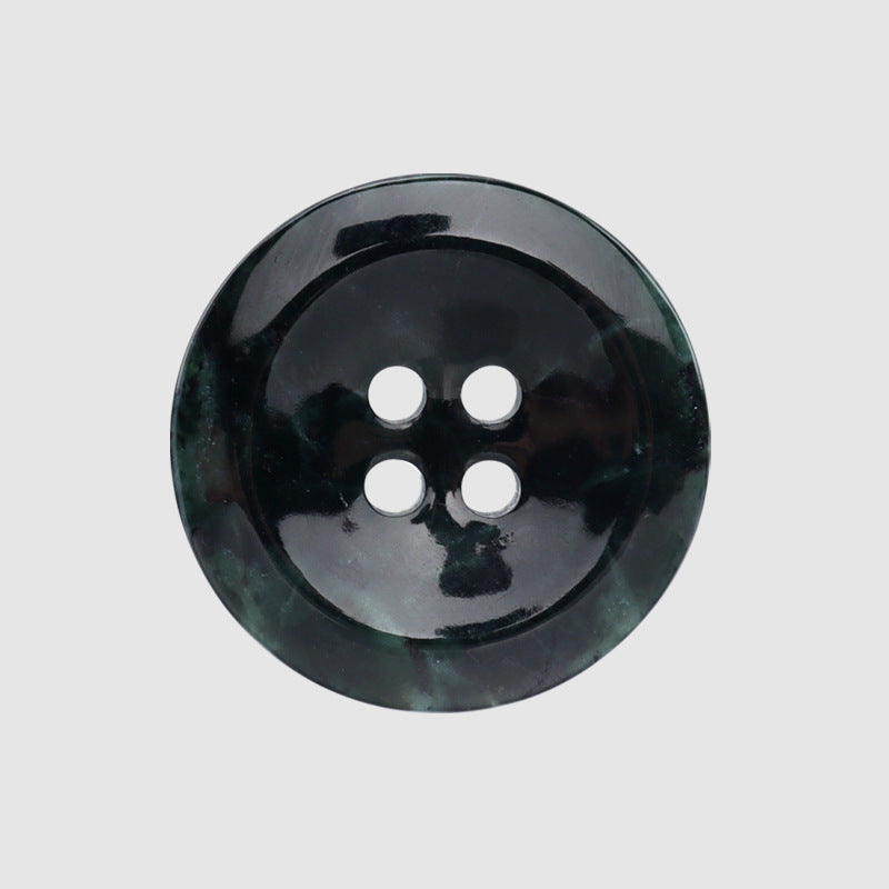 Close-up glossy dark green round 4-hole jade button, natural Xiuyan, 15/20 mm