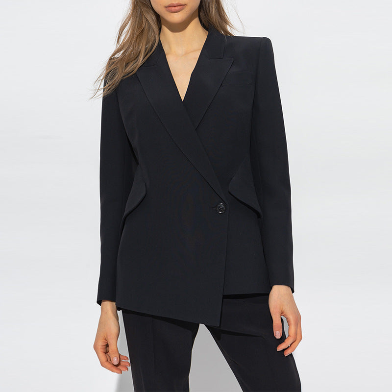 Four-hole dark green jade button on black blazer front