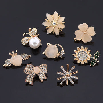 8-pack golden brooches with flower, snowflake, bee, cat, clover, bow and angel designs