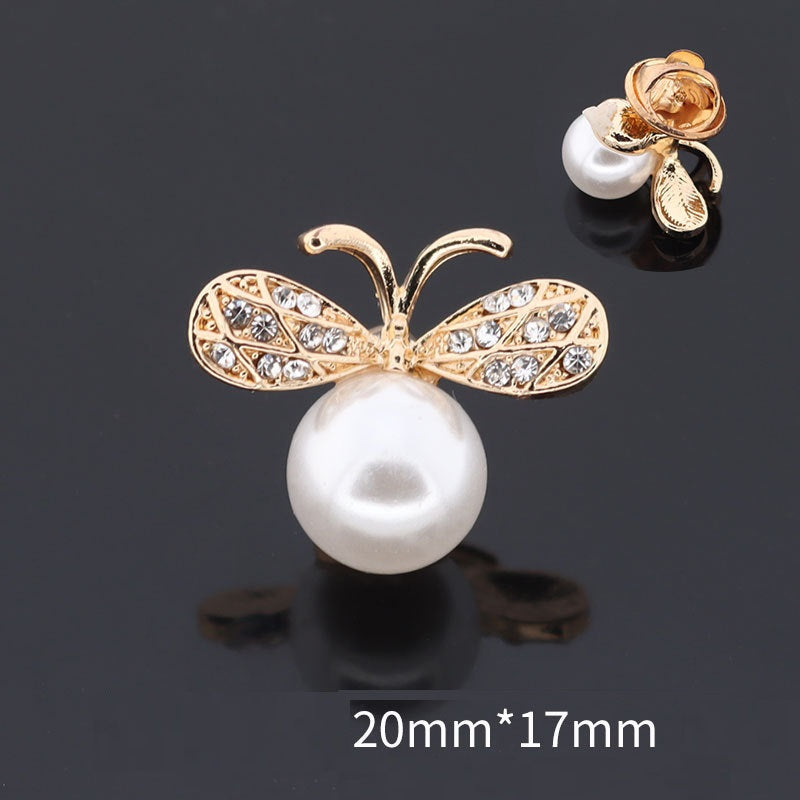 Golden butterfly brooch with white pearl drop and rhinestone wings, 20mmx17mm