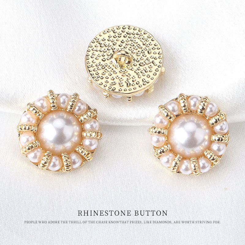 Three 18mm golden round pearl buttons; one shows the flat gold reverse side