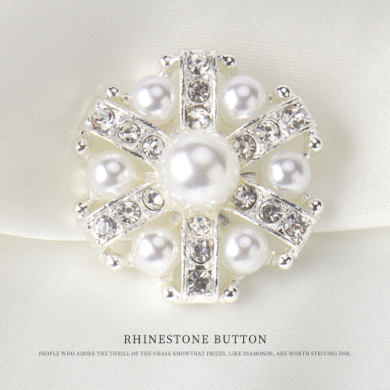 Silver rhinestone pearl button with shank, round pearl-like center and crystal bars