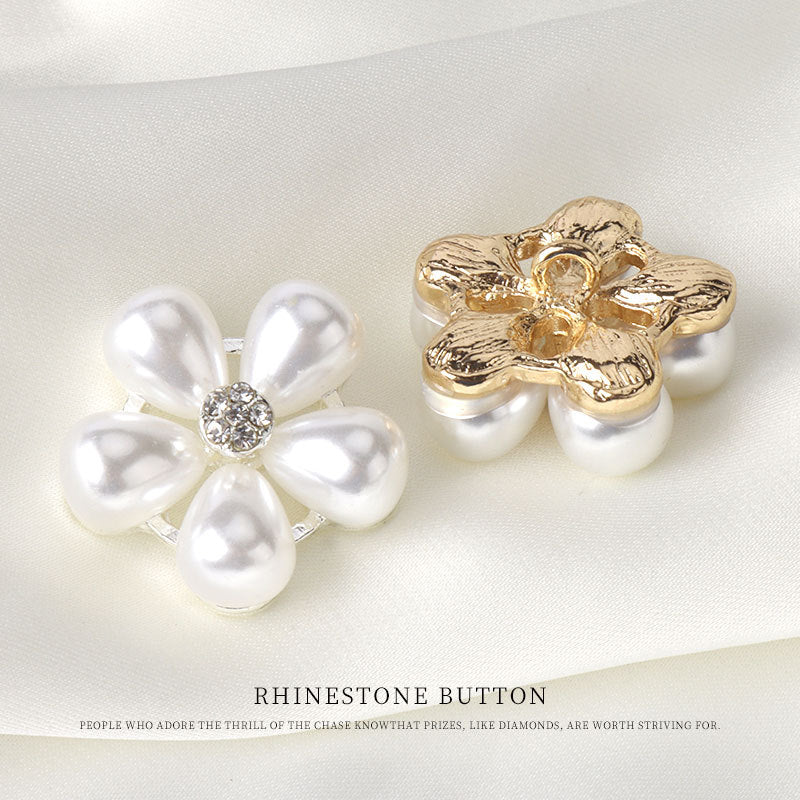 Pearl flower rhinestone button with gold-tone metal top and white pearl petals