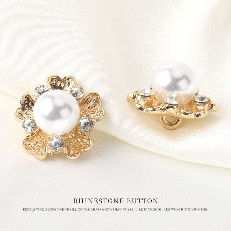 Pair view: white pearl center with clear rhinestones in gold floral setting