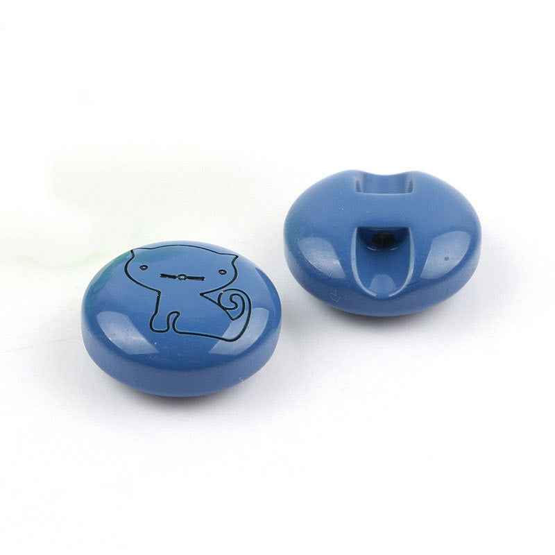 Blue animal cartoon button pair: front illustration and back with sew-through hole