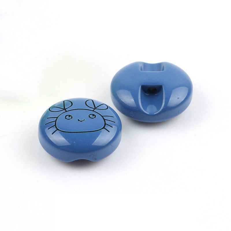 11mm Resin Cartoon Buttons: blue crab face front, back view with attachment hole