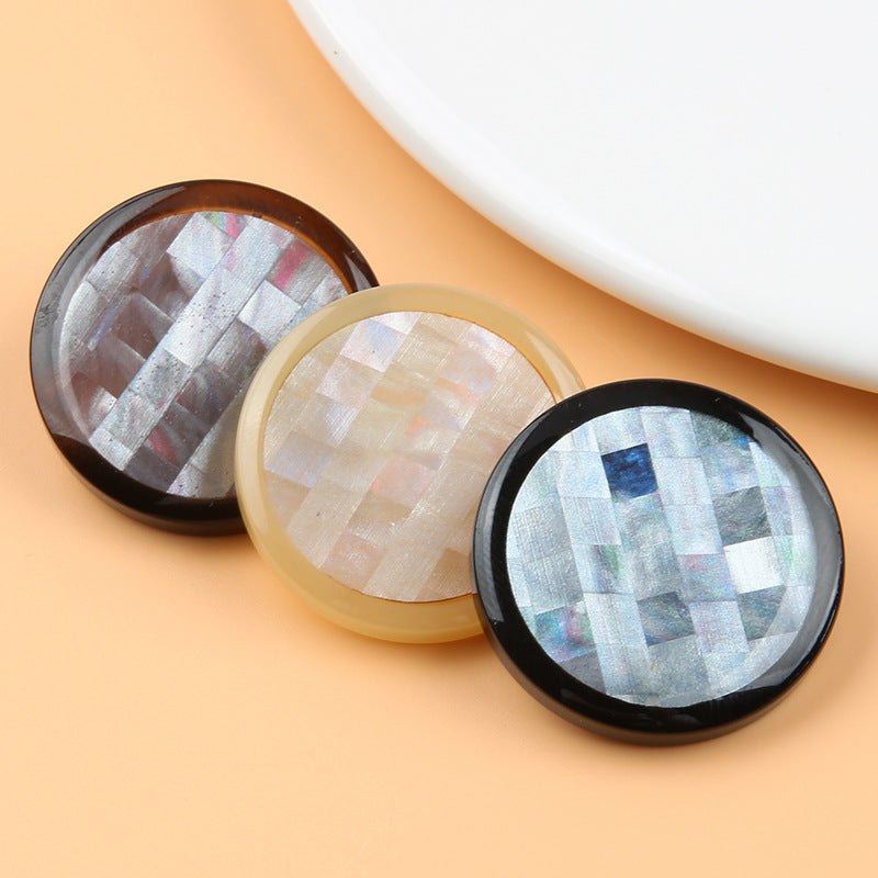 Three mosaic round resin shank buttons: dark brown, beige, and black with iridescent fronts