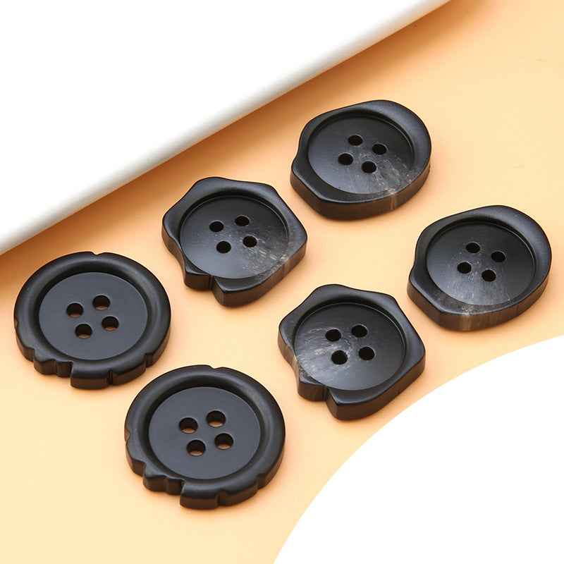 Black 4-hole resin buttons, round scalloped shape, top view set