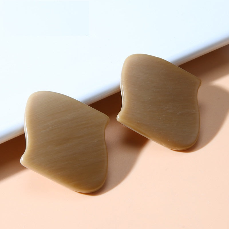 Khaki light-beige irregular resin buttons with shanks, curved irregular shape, two pieces