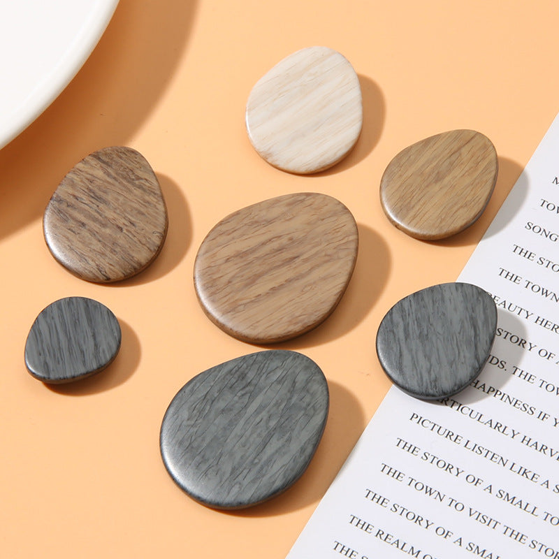 Set of oval resin shank buttons with wood-grain faces in gray, beige, brown tones