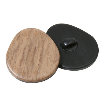 Oval wood-grain resin shank button, light beige face with black shank back
