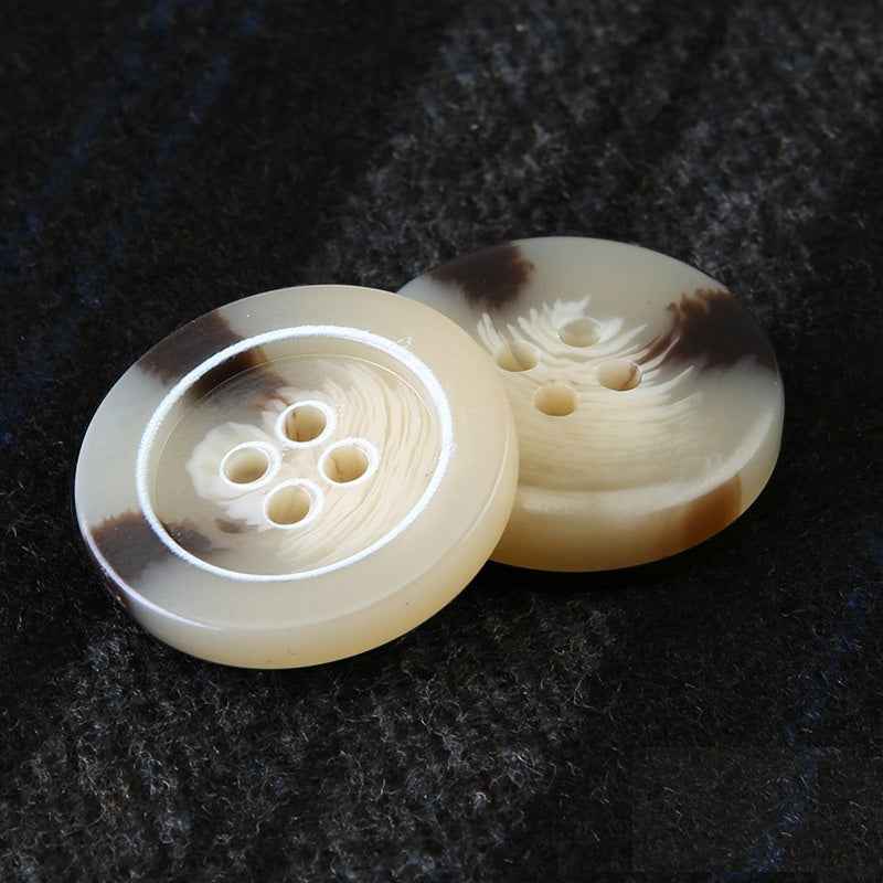 Light beige/khaki round resin four-hole buttons, front and back views
